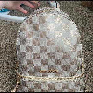 Micheal Koran rose gold back pack